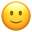 Emoji de cara ligeramente sonriente en Apple, iOS