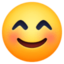 Emoji de cara feliz en Facebook