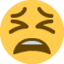 Emoji de cara cansada en Twitter